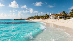 Luxury beach in Turks and Caicos with turquoise water and private villas